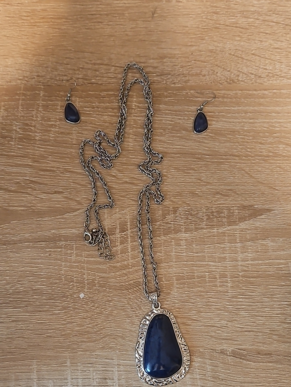 Silver Tone Necklace and Teardrop Earring Set with Deep Blue Stones